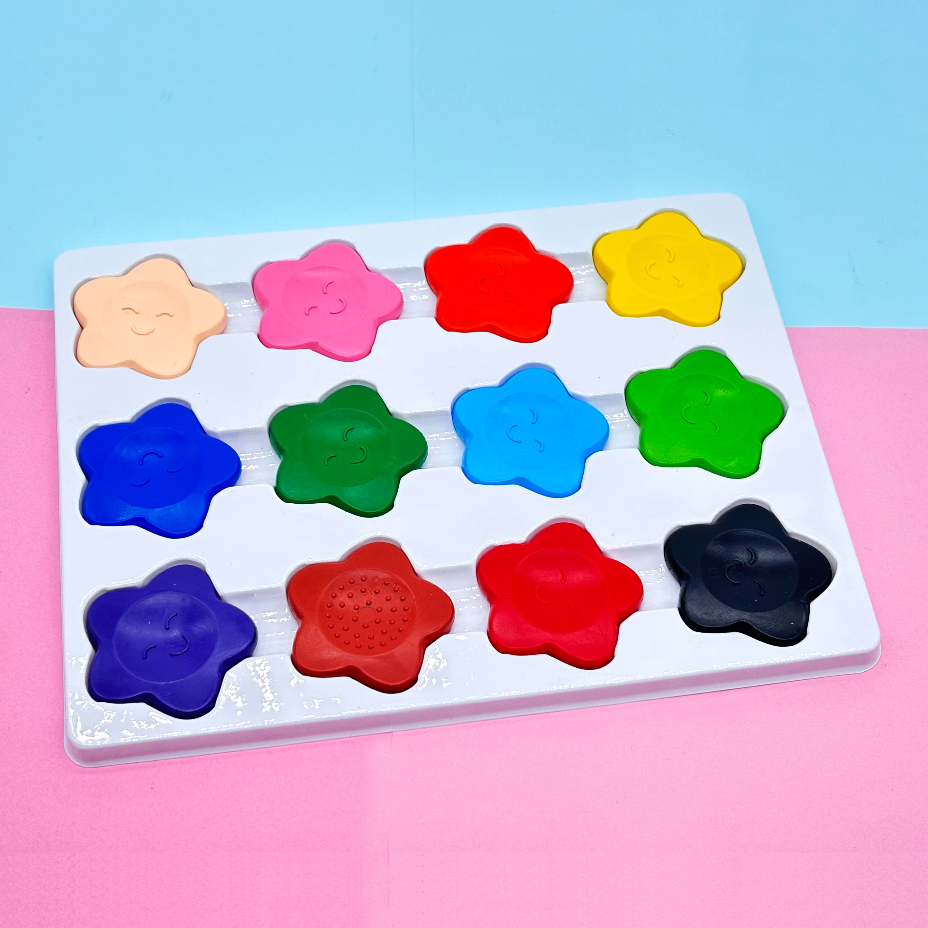 Plastic crayon in figured shape